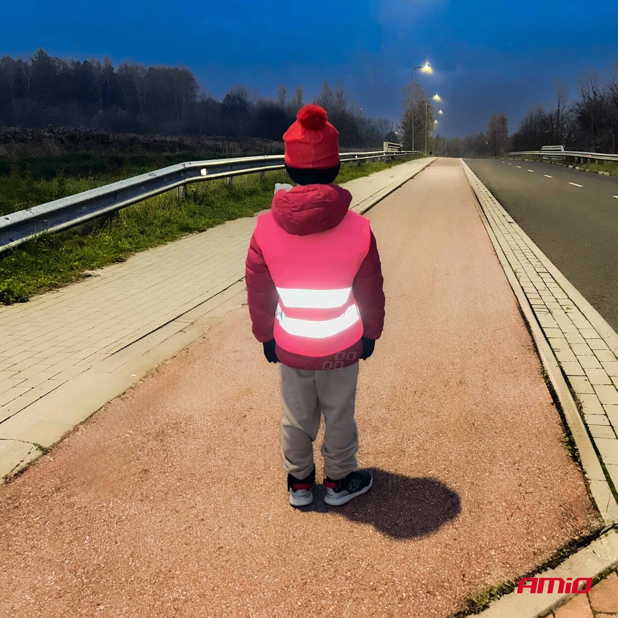 Pink sikkerhedsvest til børn set fra siden